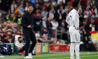 Xabi Alonso and Vinicius Junior of Real Madrid