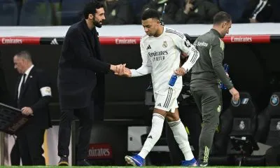 Alvaro Arbeloa and Kylian Mbappe of Real Madrid