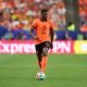 Denzel Dumfries of the Netherlands