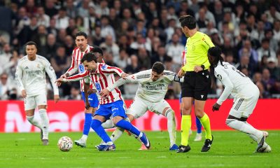 Alex Baena of Atletico Madrid and Federico Valverde of Real Madrid