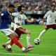 Kylian Mbappe #10 of France and Marc Cucurella #24 of Spain