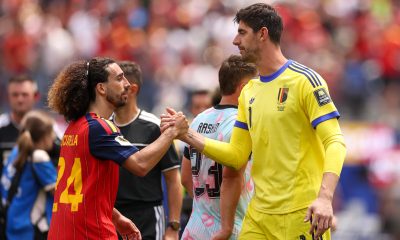 Marc Cucurella and Thibaut Courtois of Real Madrid